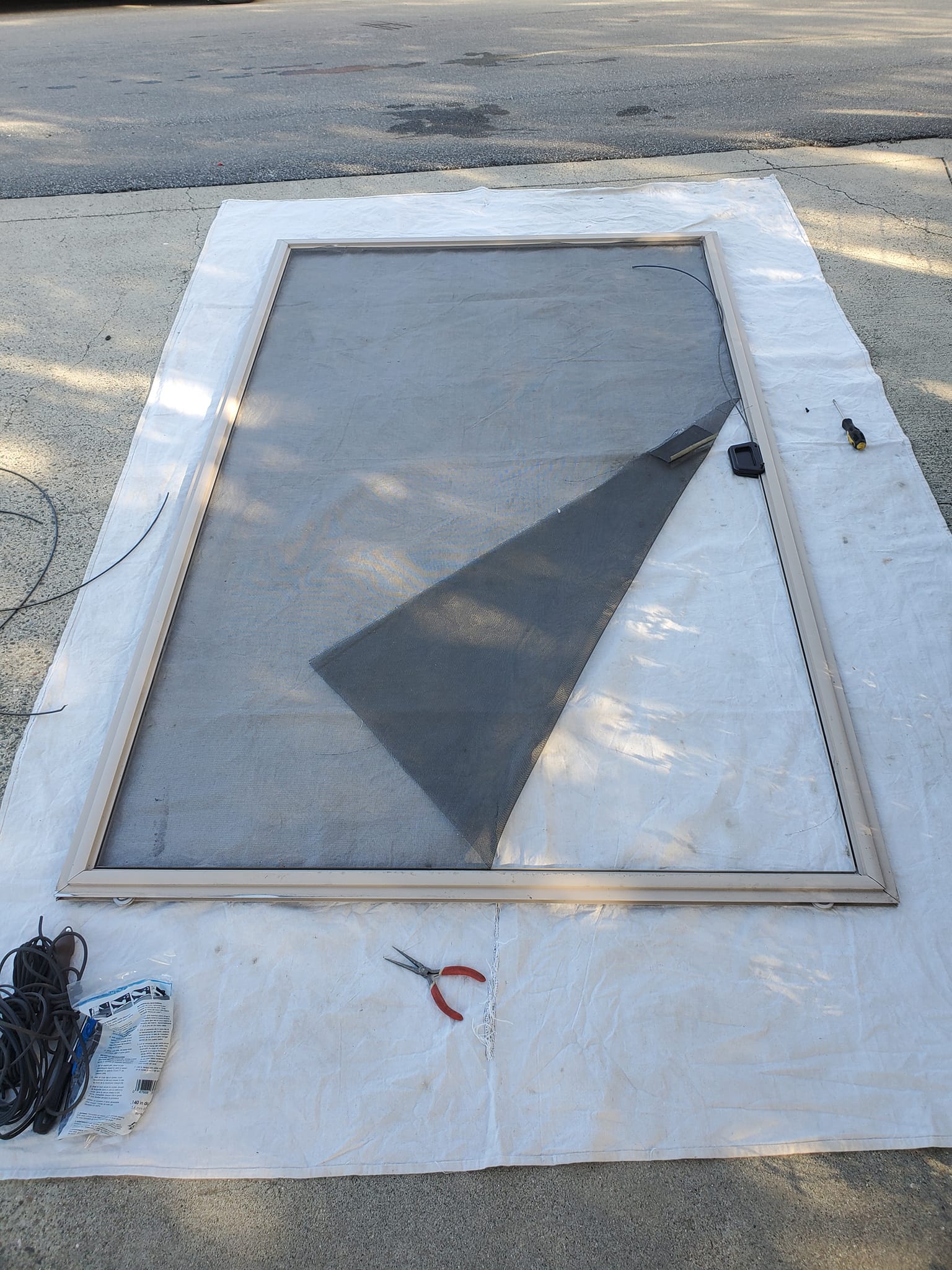 Large window screen — before re-screening