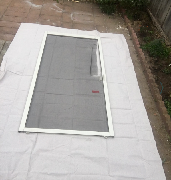 Large window screen — before repair