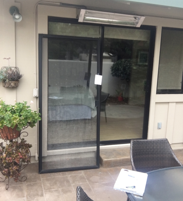 Sliding patio door screen — installation in progress